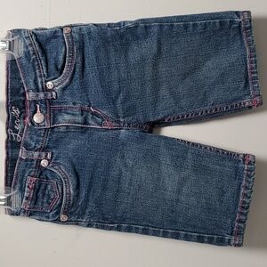 Levi's Size 6 levi shorts with pink detail & embroidered butterfly back pockets